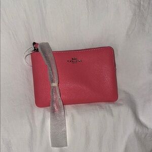 Coach Vibrant Pink Wristlet with Silver Accents